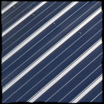 Texture de zinc. Couverture Delalande, spécialiste en couverture zinc à Vieux Viel, Ille-et-Vilaine (35) - Bretagne.